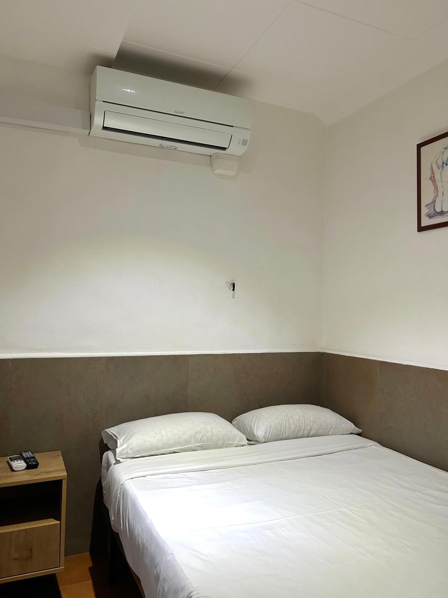 Habitación Doble con aseo compartido